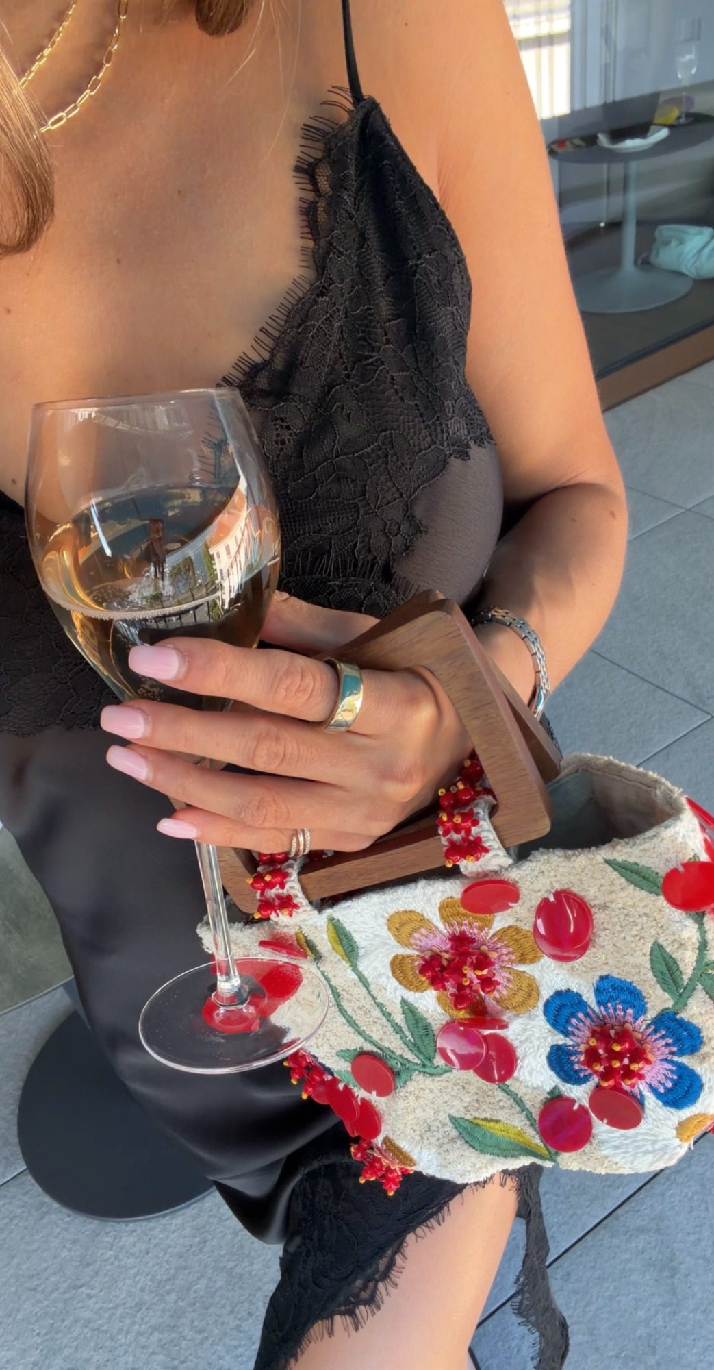 Champagne on a Locarno balcony overlooking the lake, marina, and mountains
