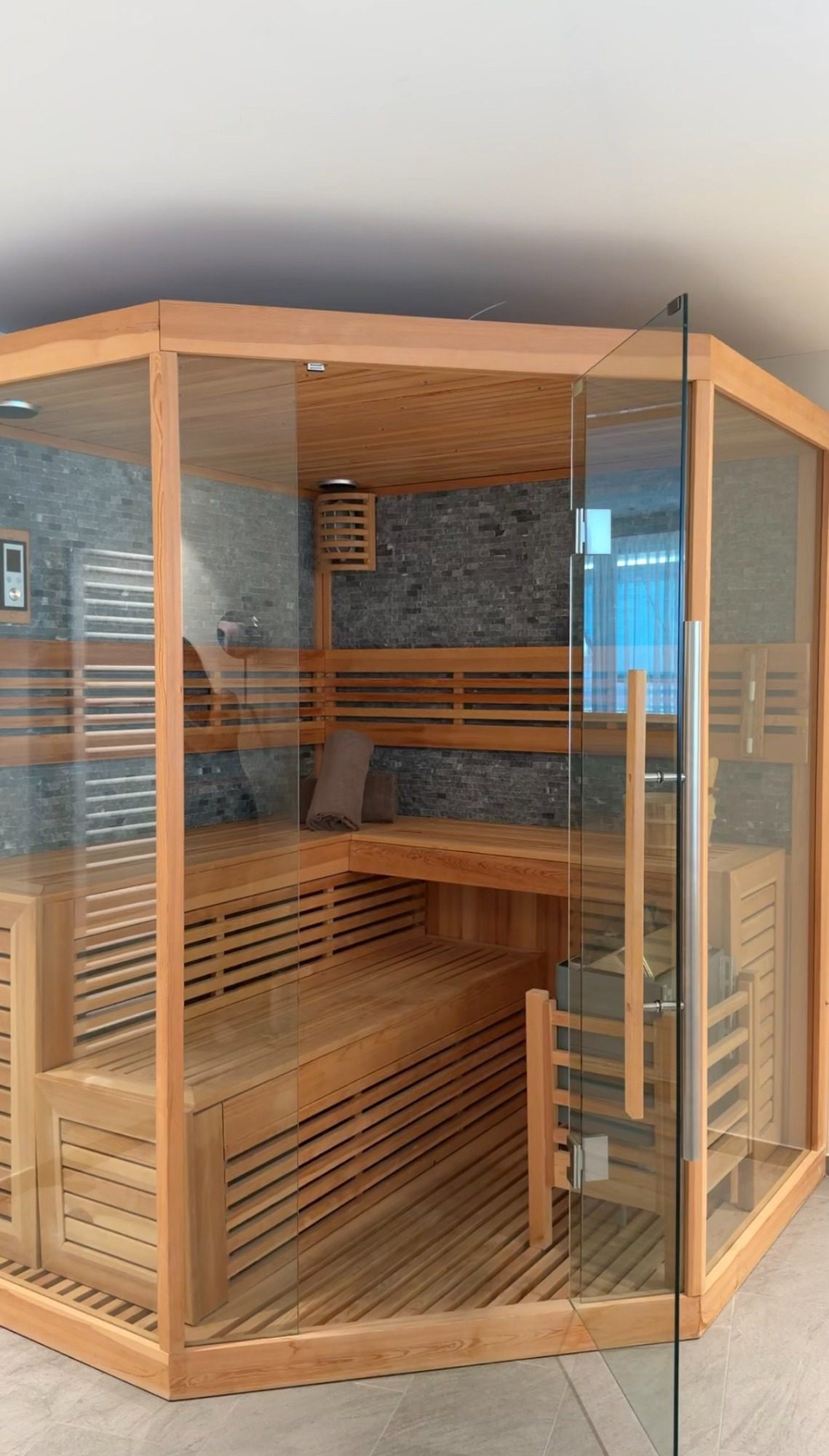 A light wood and glass sauna in a Locarno hotel